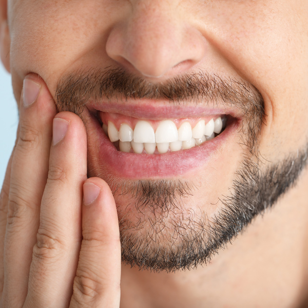 Zahnschmerzen vor einer Wurzelkanalbehandlung